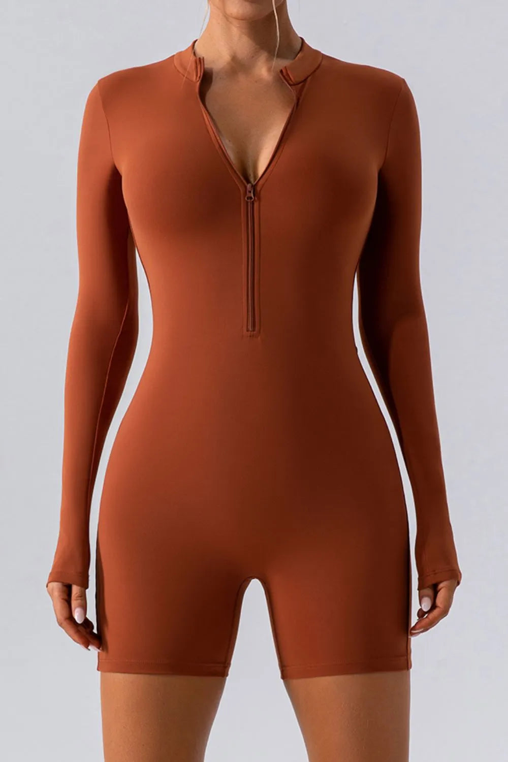 Barevici Vantage half zip active romper women’s long sleeve sculpting one piece in caramel
