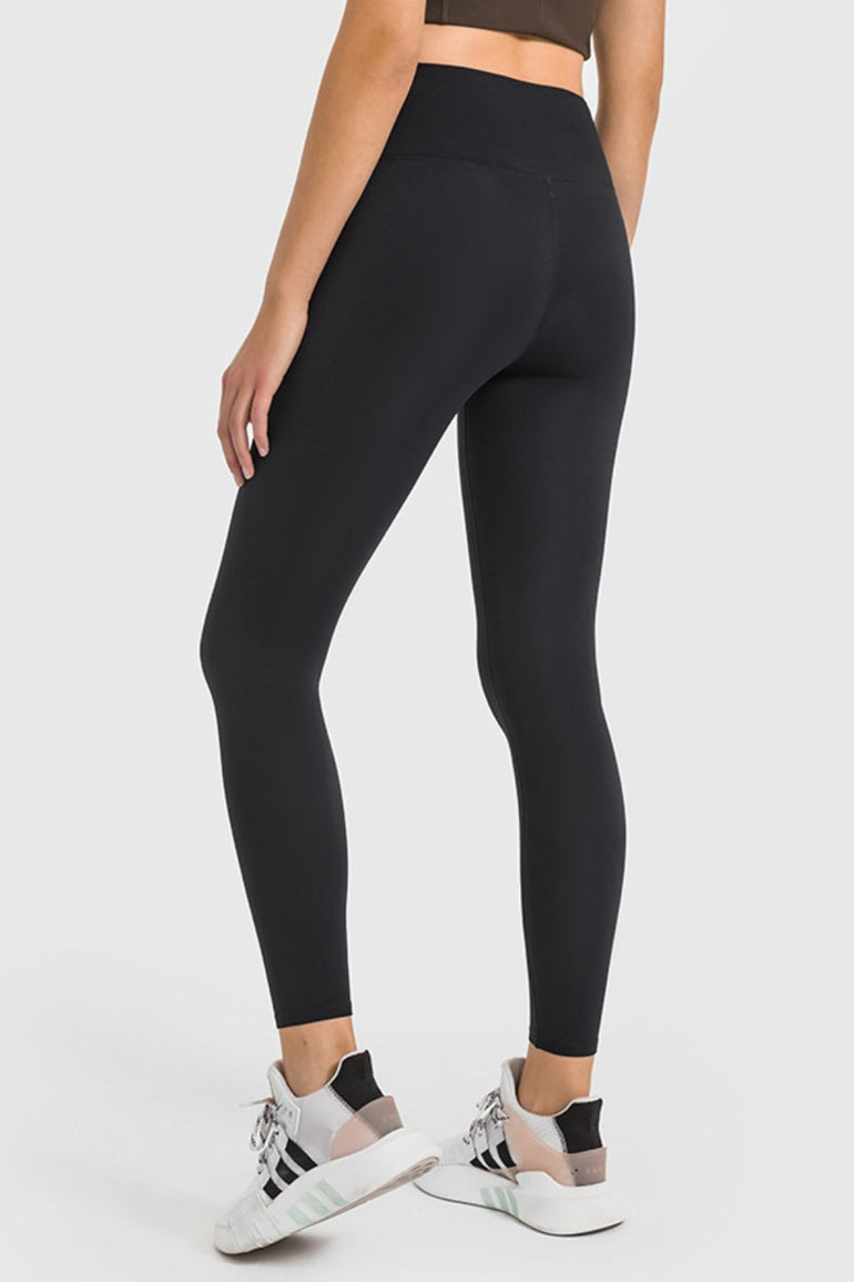 Barevici Millennia high waist yoga leggings women’s ankle length sculpting active tights in Black. back view.