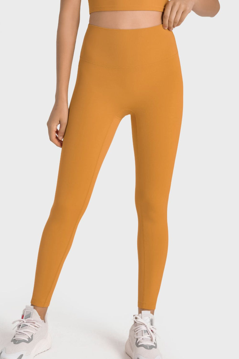 Barevici Millennia wideband yoga leggings women’s high rise sculpting tights in tangerine.