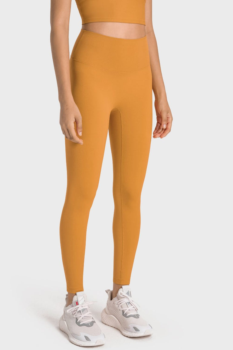 Barevici Millennia wideband yoga leggings women’s high rise sculpting tights in tangerine.