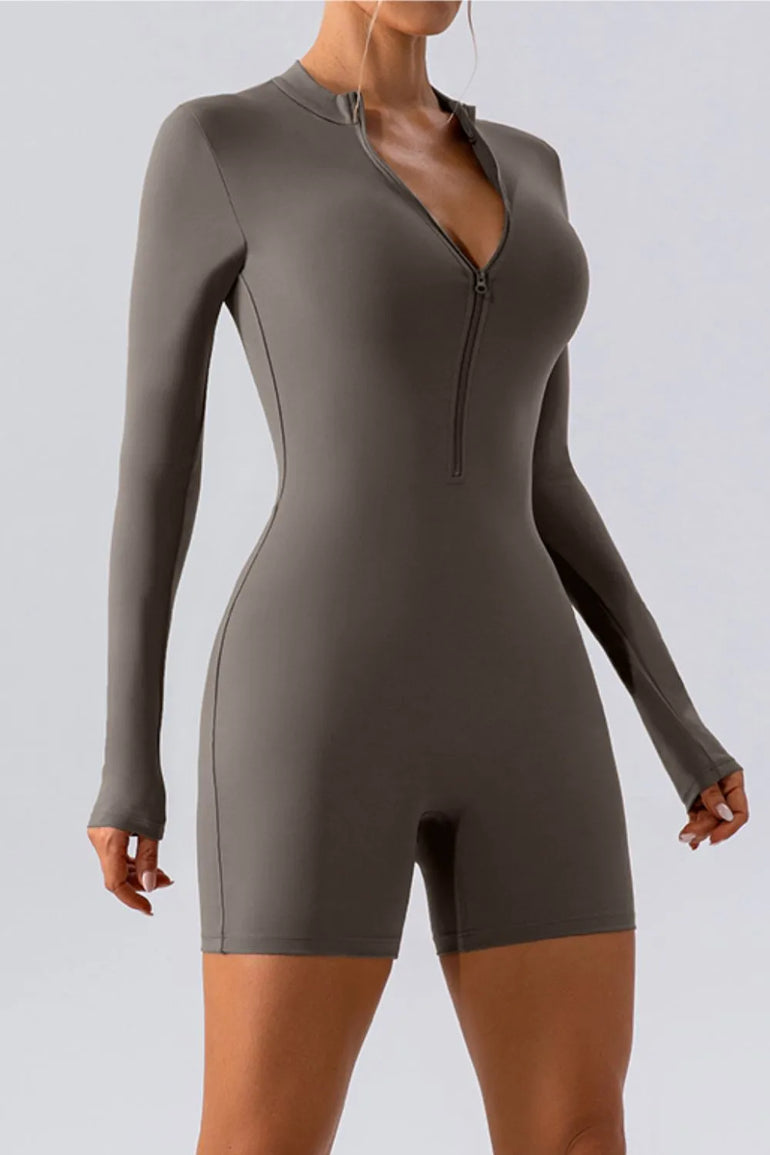 Barevici Vantage half zip active romper women’s long sleeve sculpting one piece in dark gray