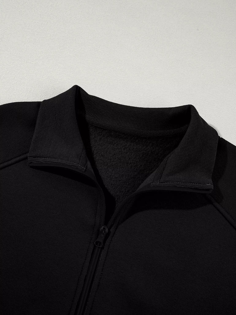 Barevici Motion zip track set women’s drop shoulder jacket and drawstring pants active co ord in black, material close up