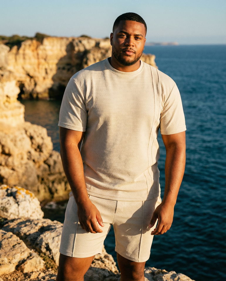 Plus size man wearing Barevici Haven Set men’s full size tee and shorts, front view
