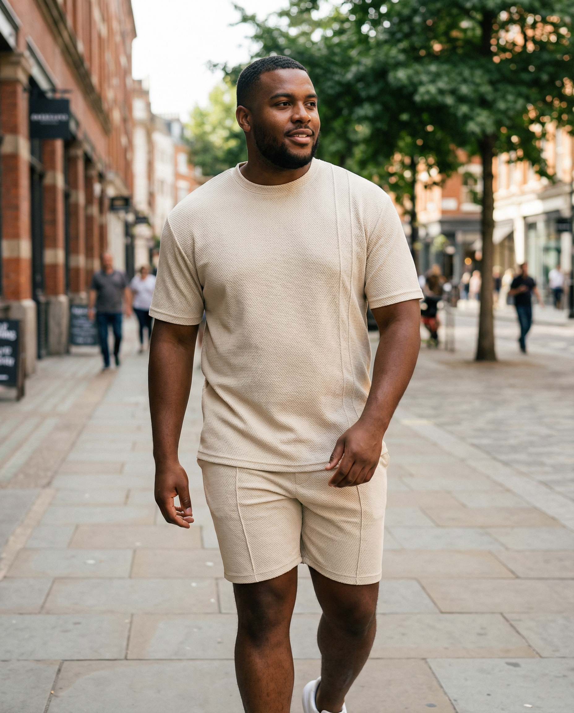 Plus size man wearing Barevici Haven Set men’s full size tee and shorts set, front view