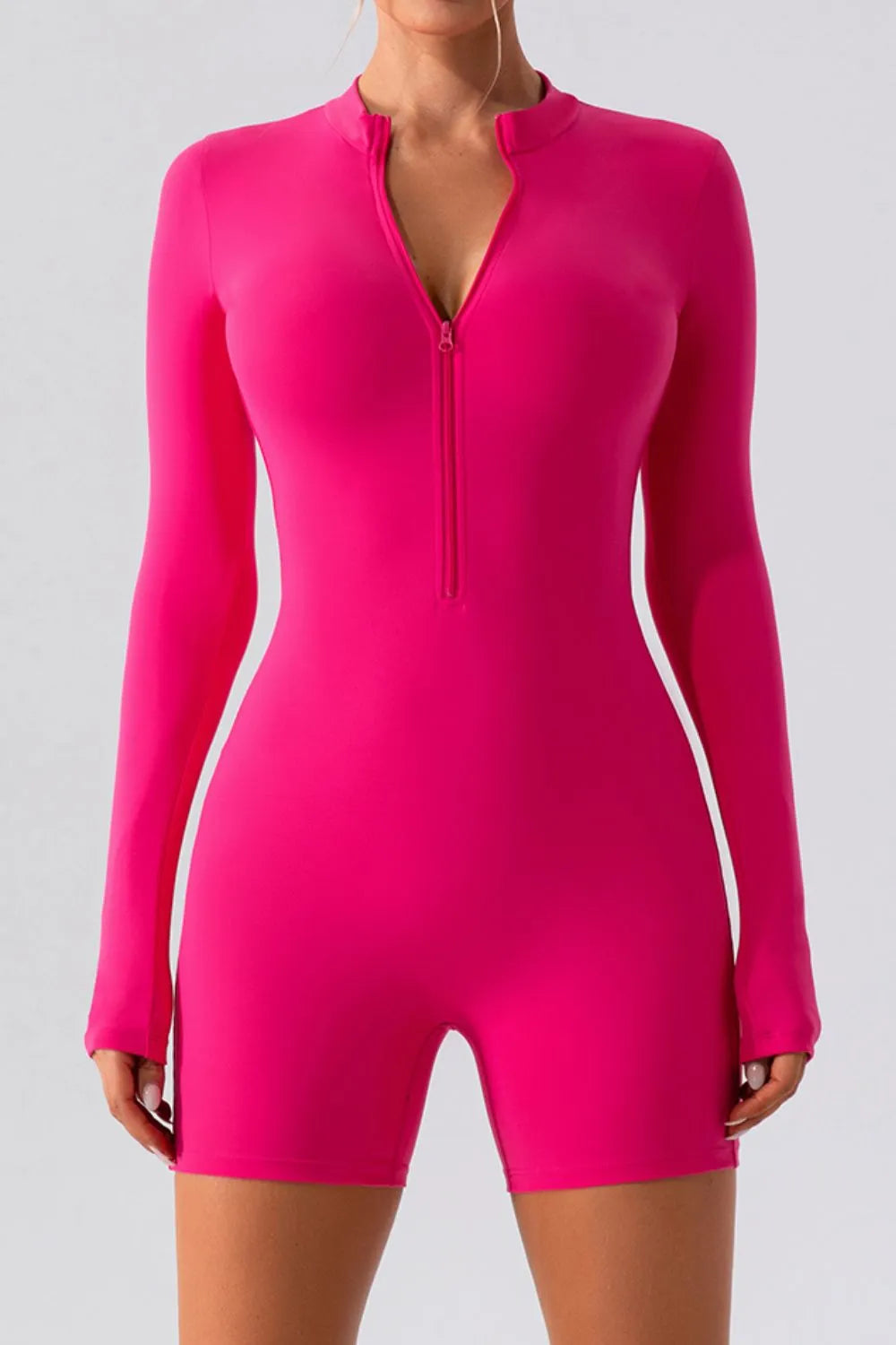Barevici Vantage half zip active romper women’s long sleeve sculpting one piece in hot pink