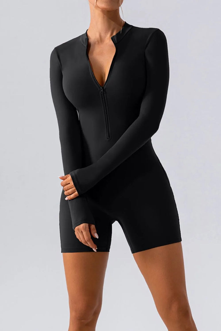 Barevici Vantage half zip active romper women’s long sleeve sculpting one piece in black