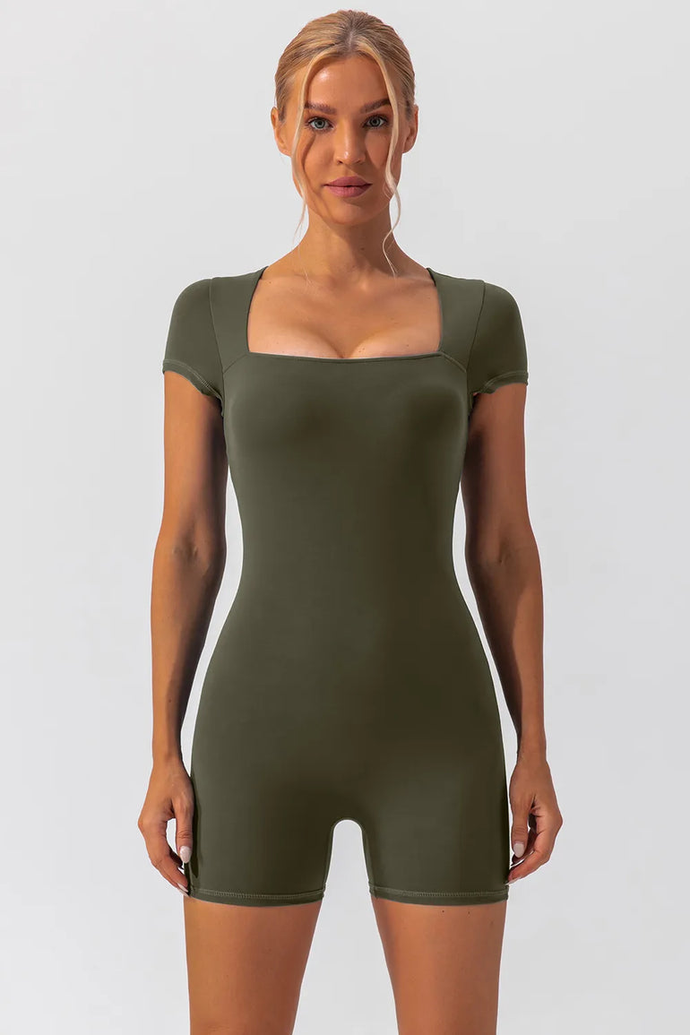 Barevici Poise cap sleeve active romper women’s square neck sculpting one piece in matcha green, front view