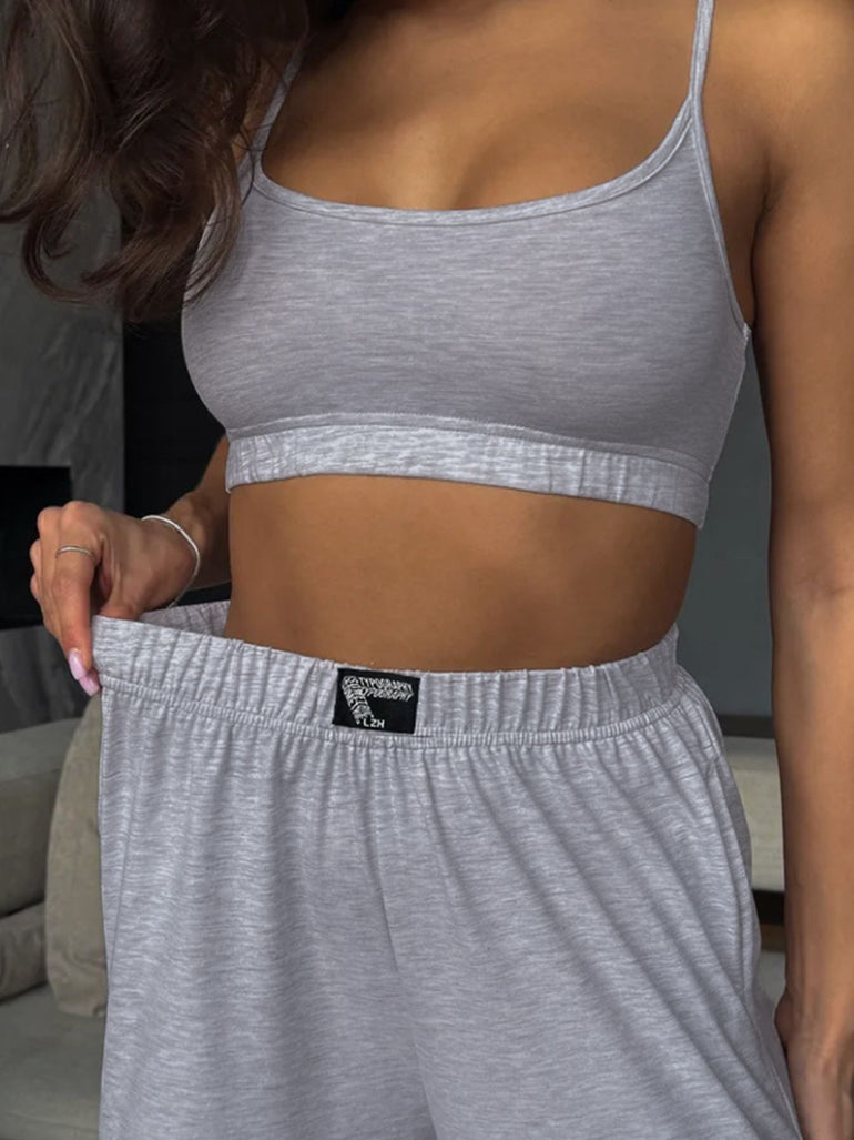 Barevici Sloan cami and pants set women’s minimalist scoop neck lounge co ord light grey on model. close up