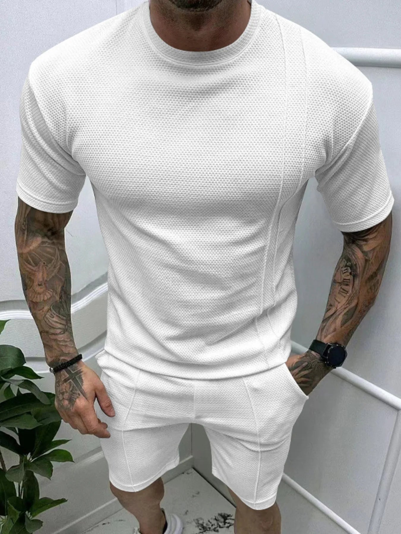  man wearing Barevici Haven Set tee and shorts set, shirt front view white