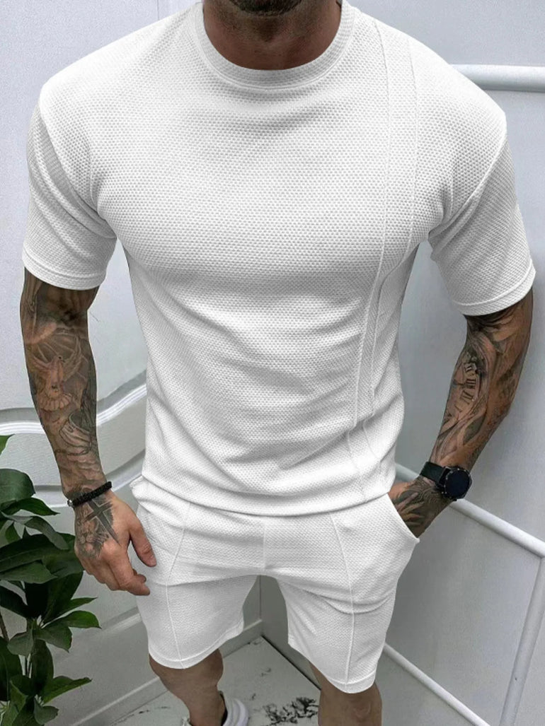  man wearing Barevici Haven Set tee and shorts set, shirt front view white