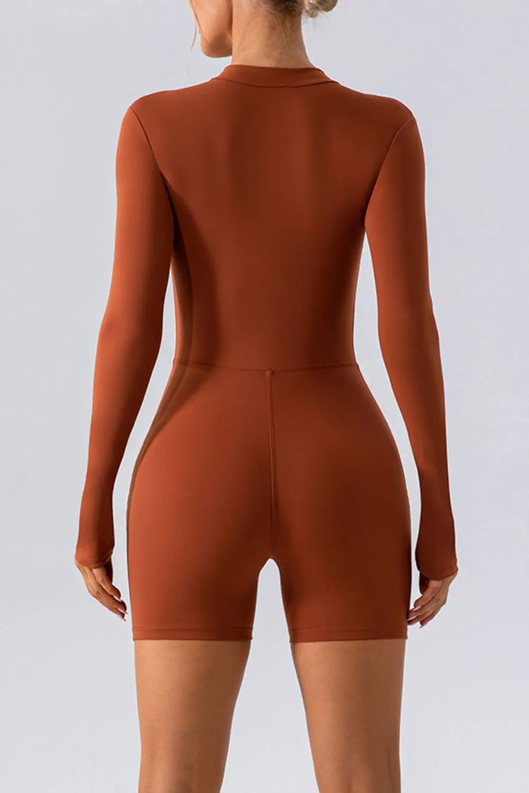 Barevici Vantage half zip active romper women’s long sleeve sculpting one piece in caramel, back view