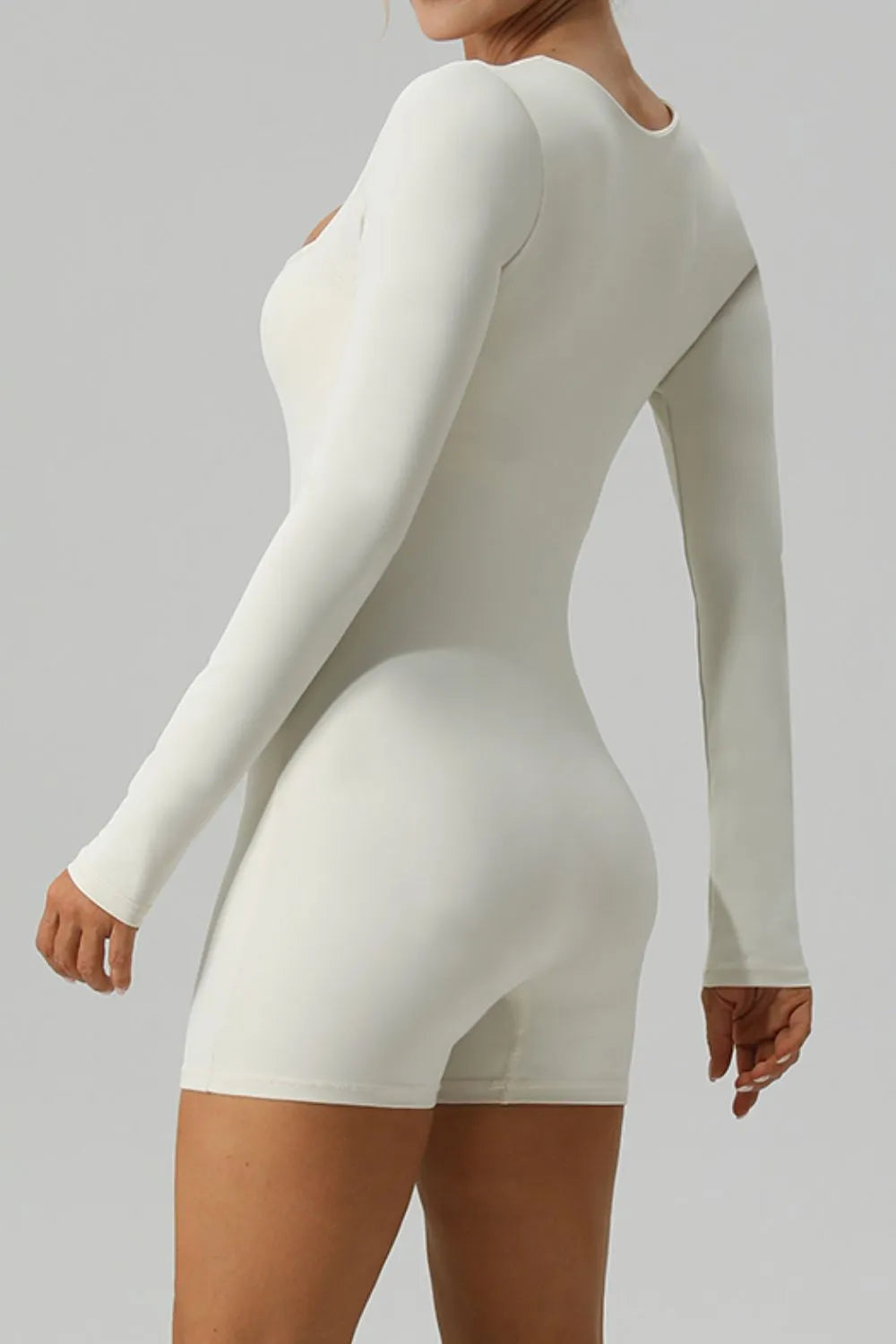 Barevici Aura long sleeve active romper women’s square neck minimalist one piece ivory back view