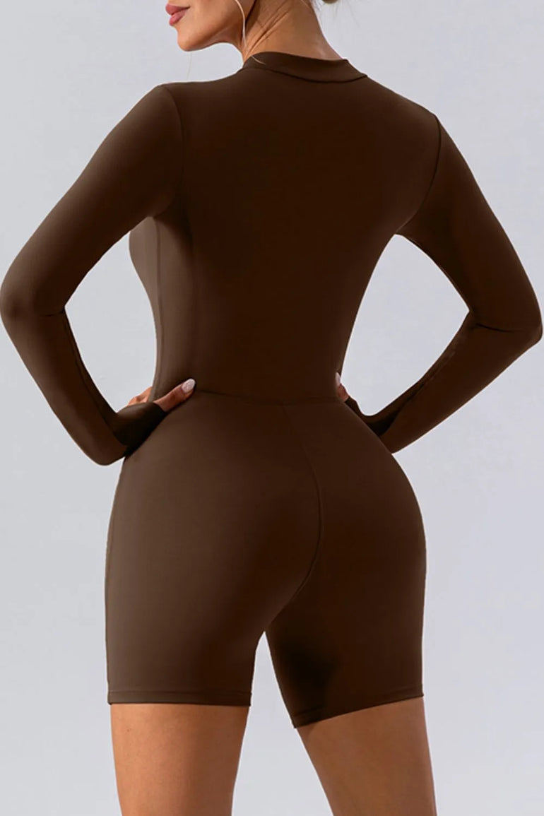Barevici Vantage half zip active romper women’s long sleeve sculpting one piece in chocolate, back view