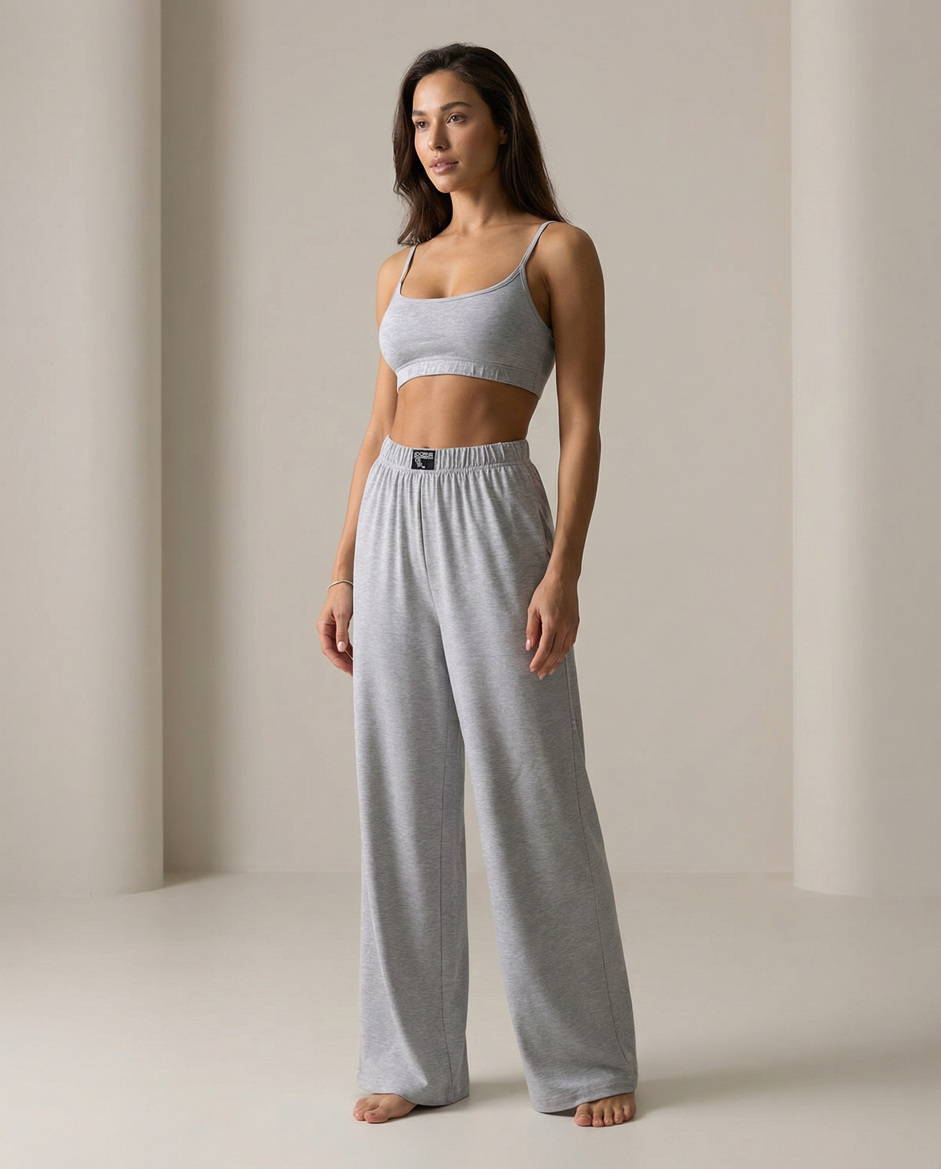 Barevici Sloan cami and pants set women’s minimalist scoop neck lounge co ord light grey on model.